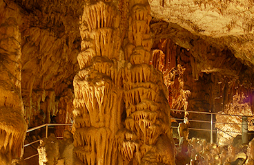 a large cave with a staircase