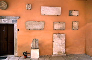 a wall with stone plaques