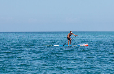 A man on a SUP board