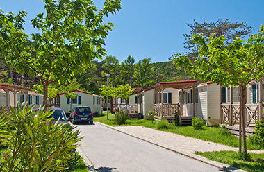 a street with houses and trees
